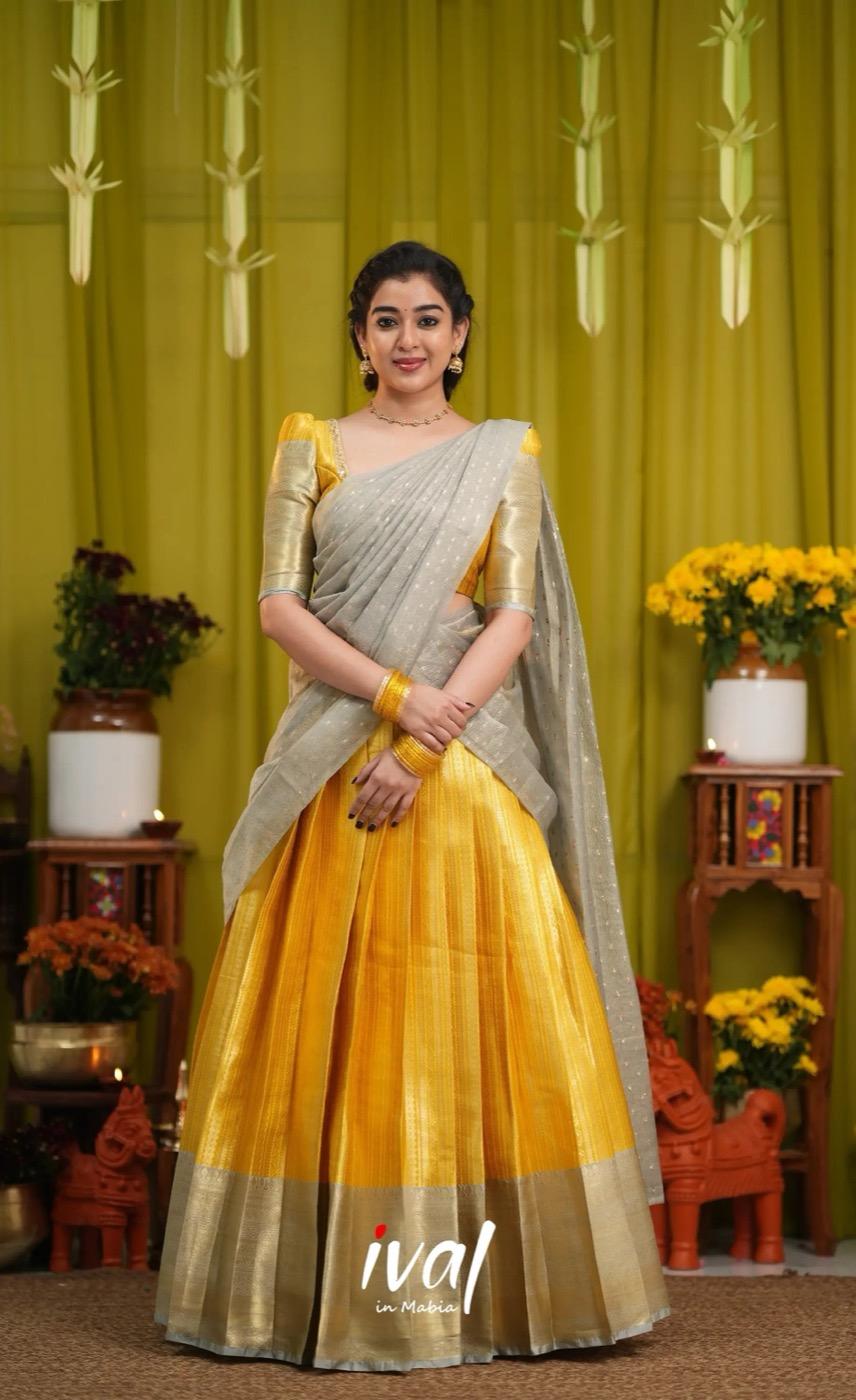 Izhaiyini Banarassi Tissue Halfsaree - Yellow and Light grey