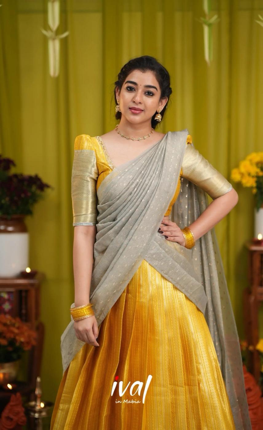 Izhaiyini Banarassi Tissue Halfsaree - Yellow and Light grey - product media